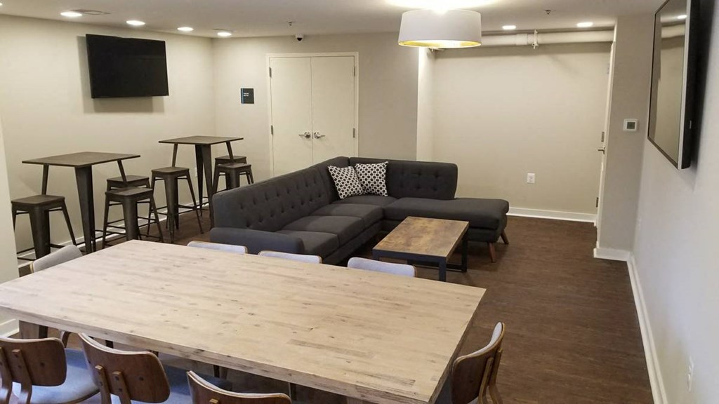 a living room with a couch and a table