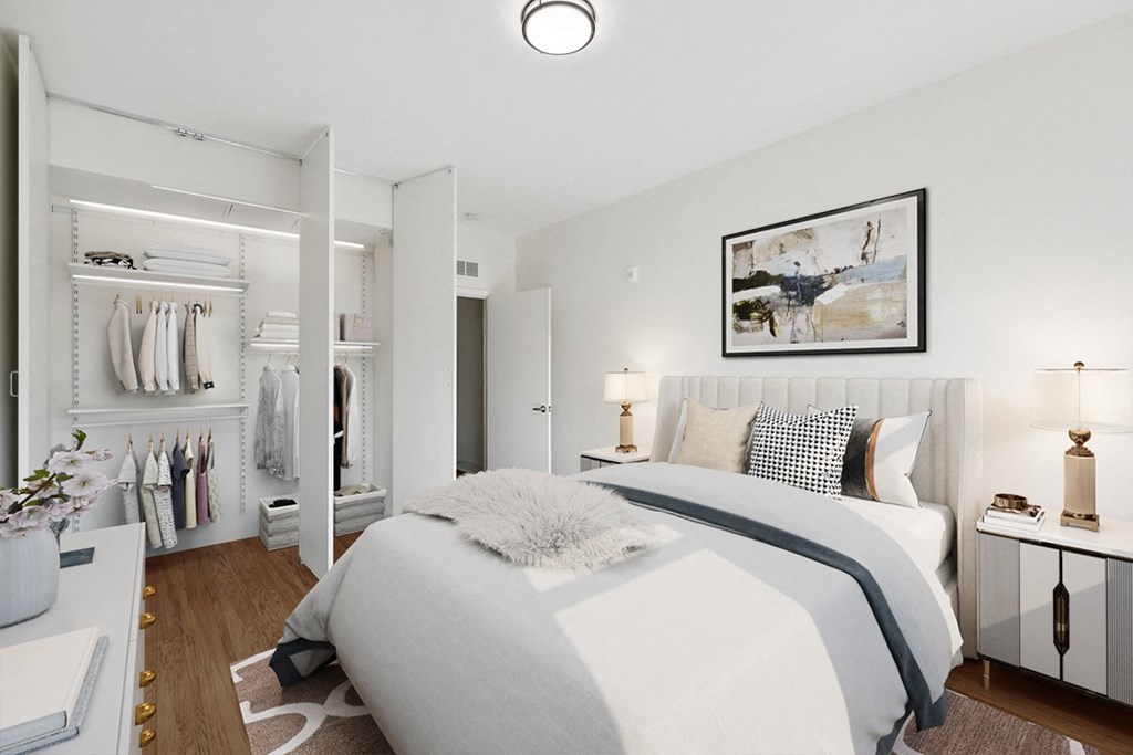 a bedroom with a bed and a closet