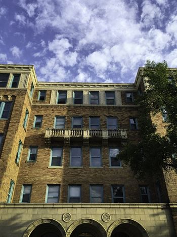 Embassy Tower exterior, showing the original architectural details.