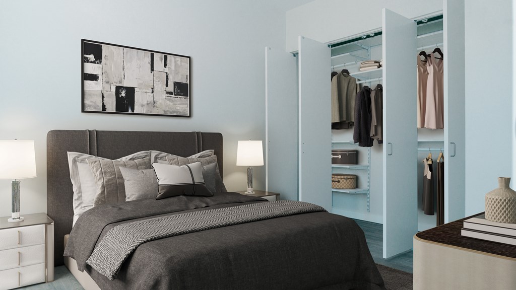 A bedroom with a large bed and a wardrobe.