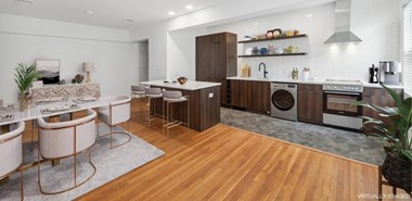 One-bedroom model apartment kitchen shown