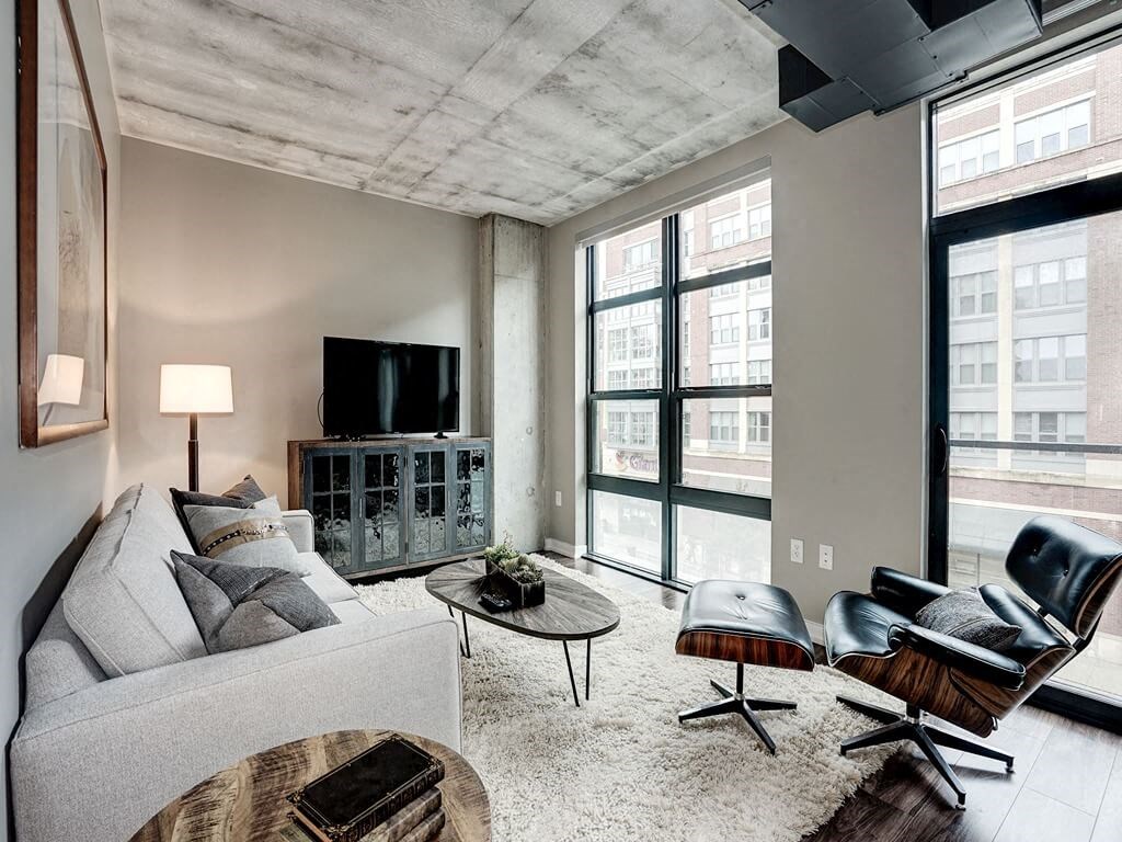 a living room with a couch and a tv