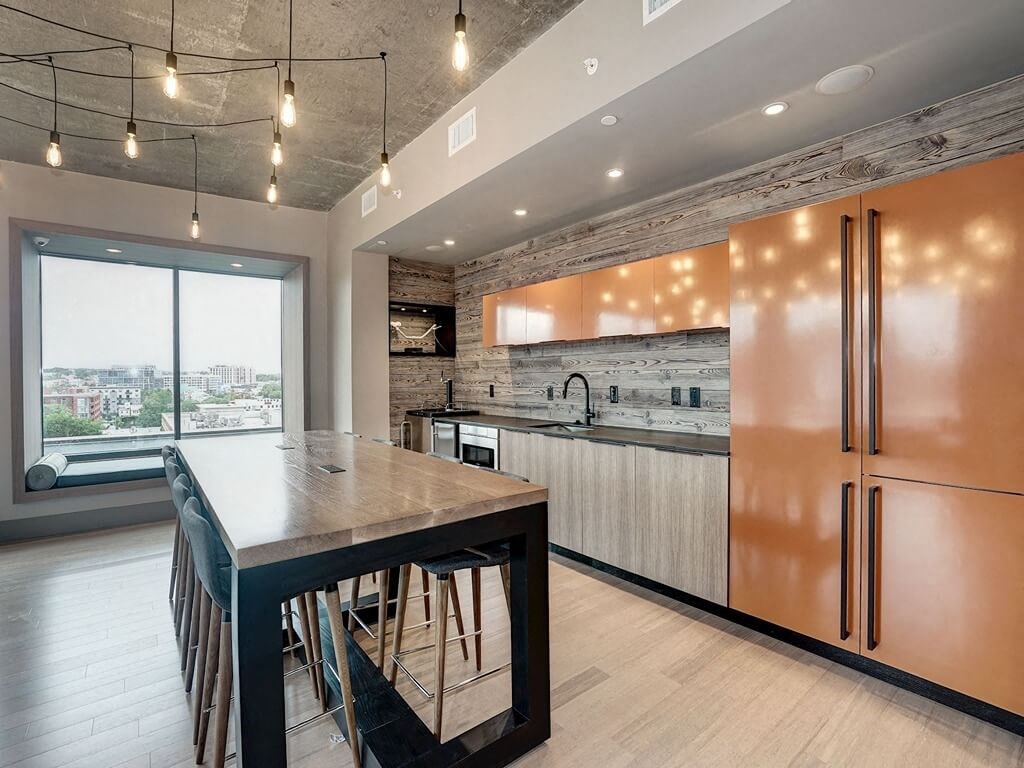a view of the lobby of a building with glass elevators