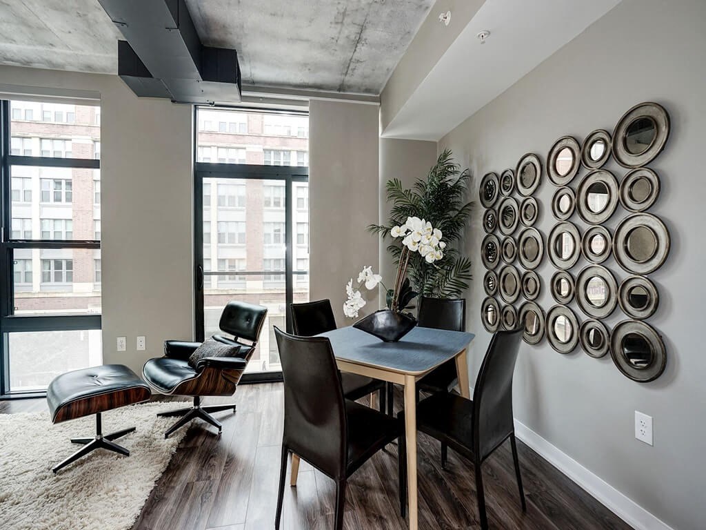 a view of a living room with a window and a table