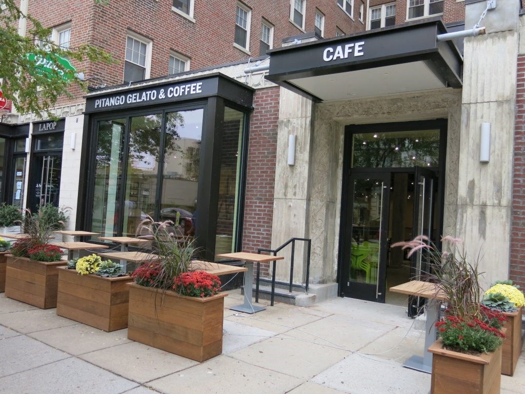 a view of the front of the cafe from the sidewalk