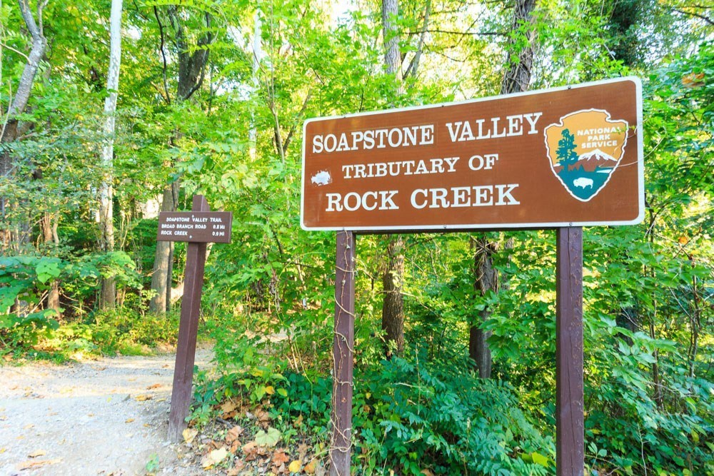 a sign for the sagottic valley tribulation of rock creek in the woods