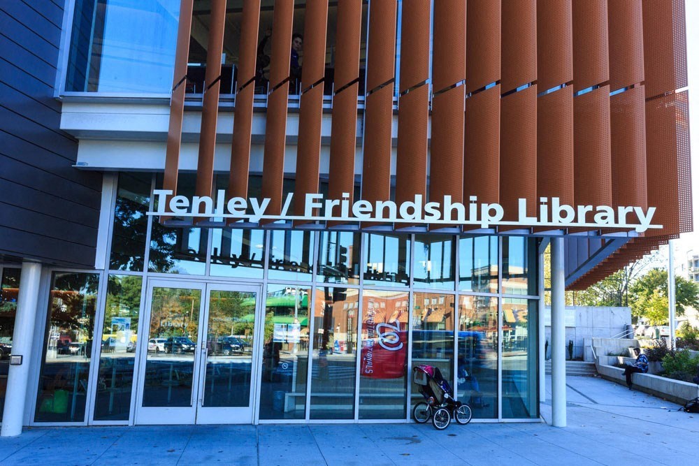 the front of a library building with a wheelchair in front of it at The Chesapeake Apartments, Washington, Washington DC