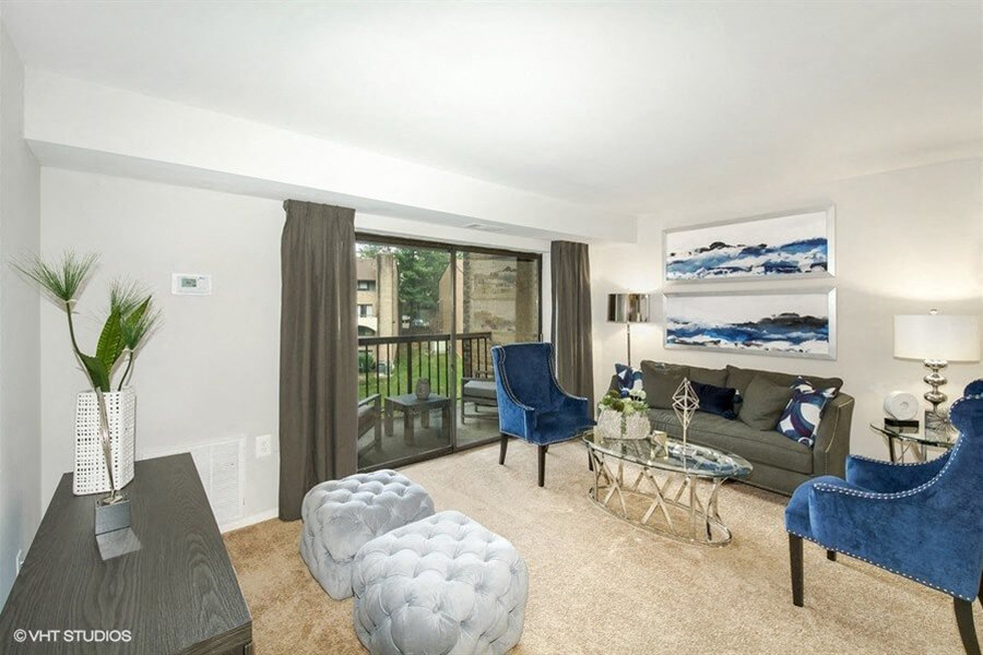 a living room with a couch and a table