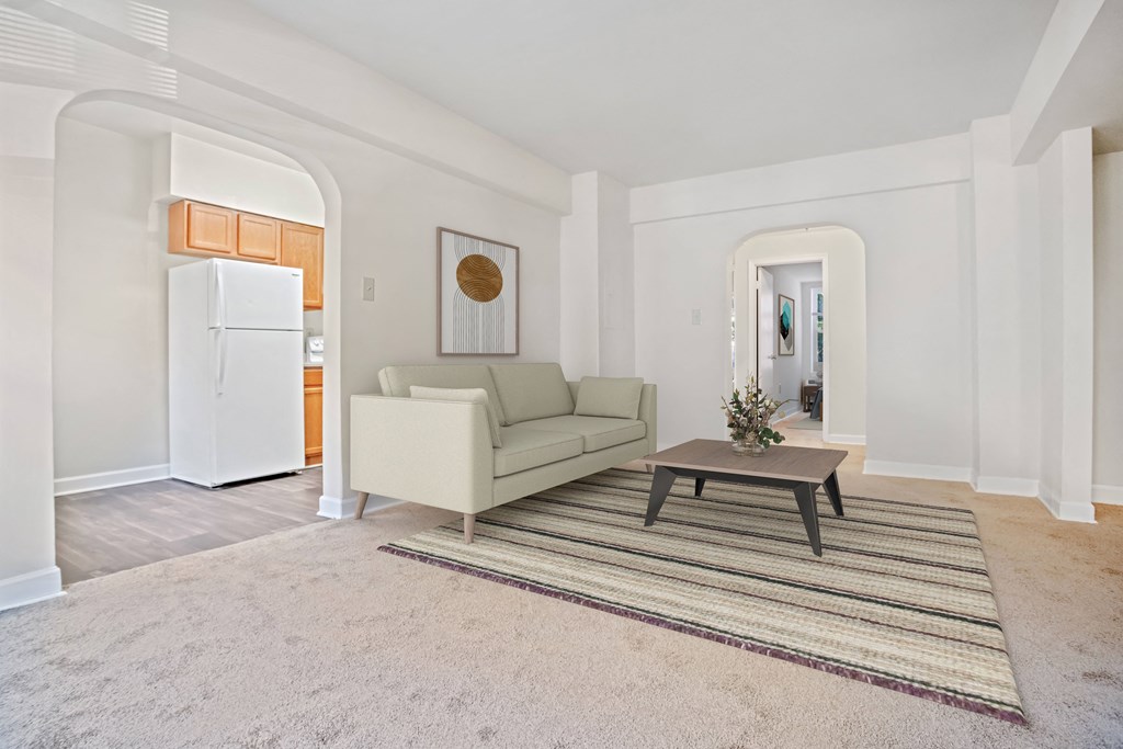 a living room with a couch and a coffee table