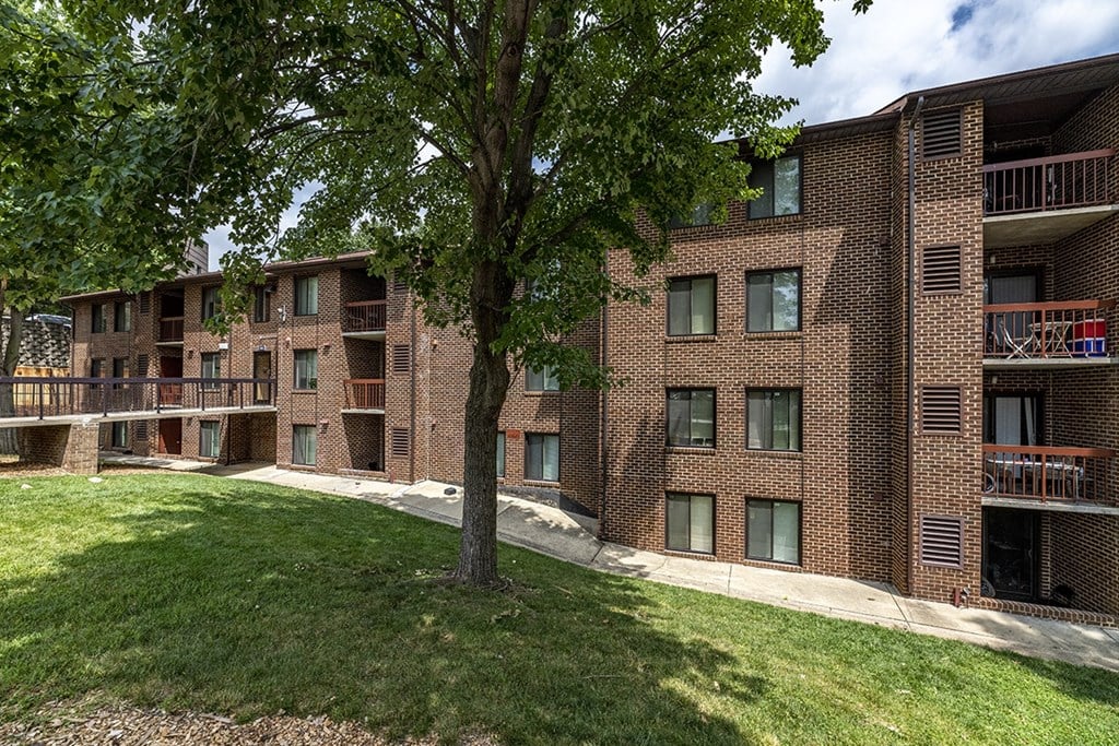 our apartments are located in a quiet area with a tree