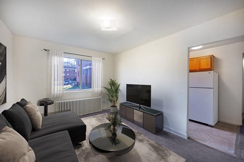 a living room with a couch and a coffee table