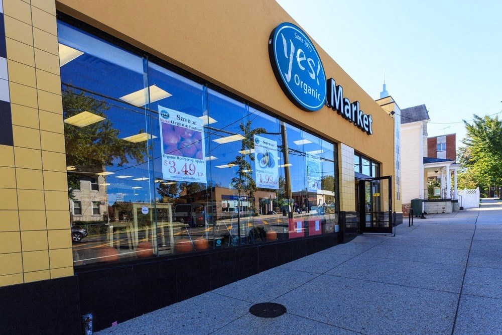 the front of a store with a large glass window at Brookland Ridge Apartments, Washington DC