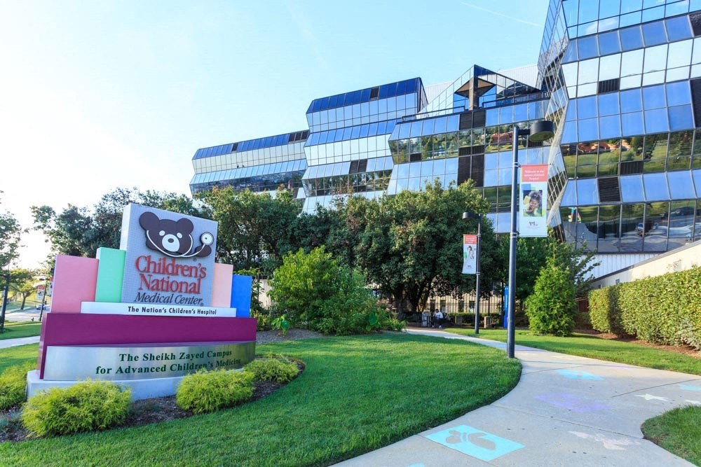 an office building with a sign at Brookland Ridge Apartments, Washington