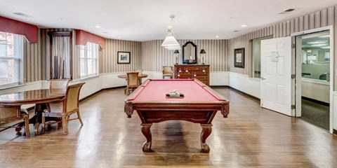 a large room with a pool table
