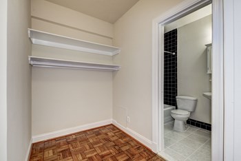 closet with white shelving at Park Crescent Apartments in Washington, DC