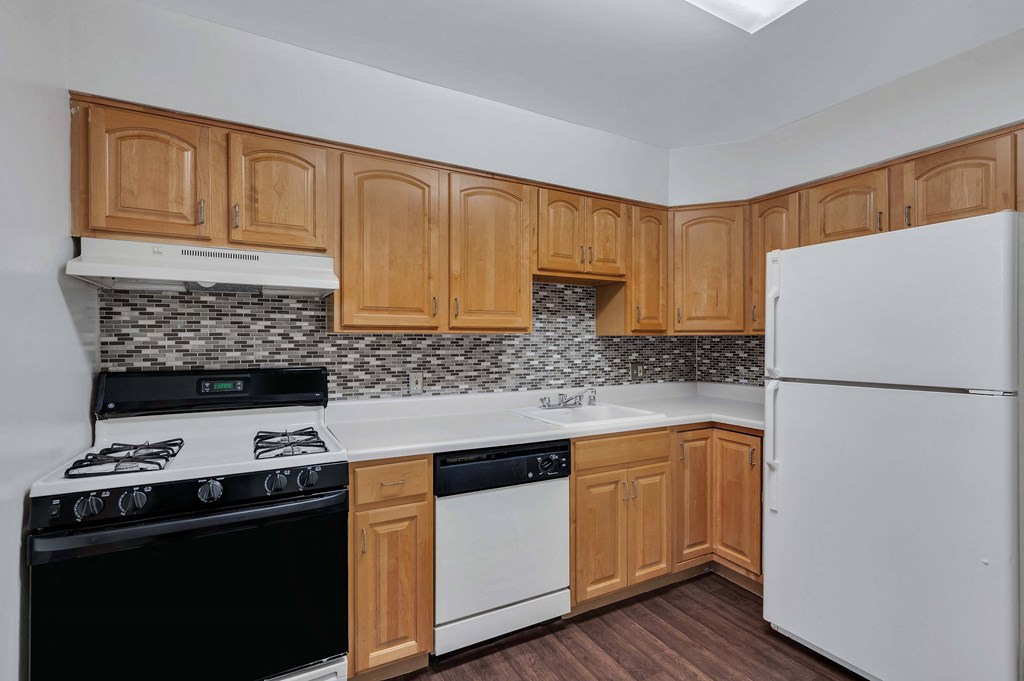Kitchen with wooden closet at Aspen at Lake Trail, Columbia, MD