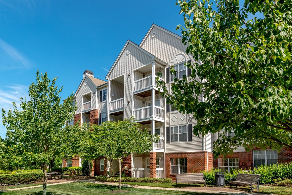 exterior with a tree-lined sidewalk at Governors Green, Bowie, 20716