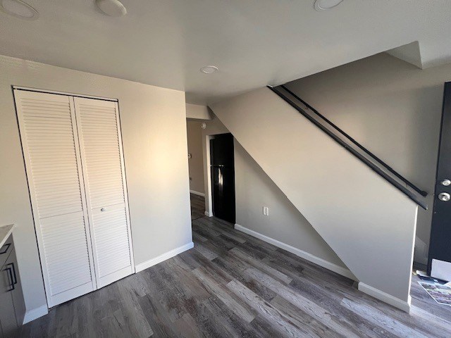 A room with a staircase leading to the upper floor. A room with a staircase leading to the upper floor at Pleasantview Apartments, Baltimore, MD, 21214