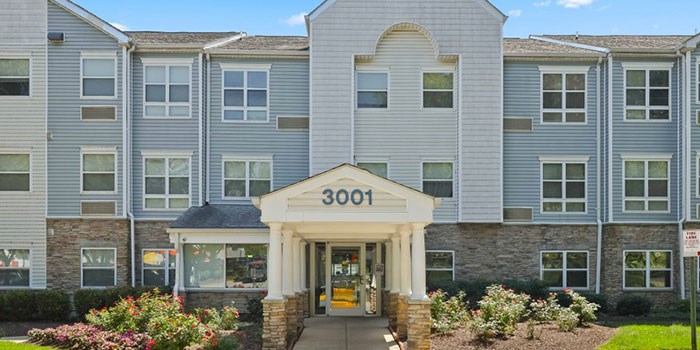 The front of a building with the number 3001 on it at Rainier Manor Apartments, Mount Rainier