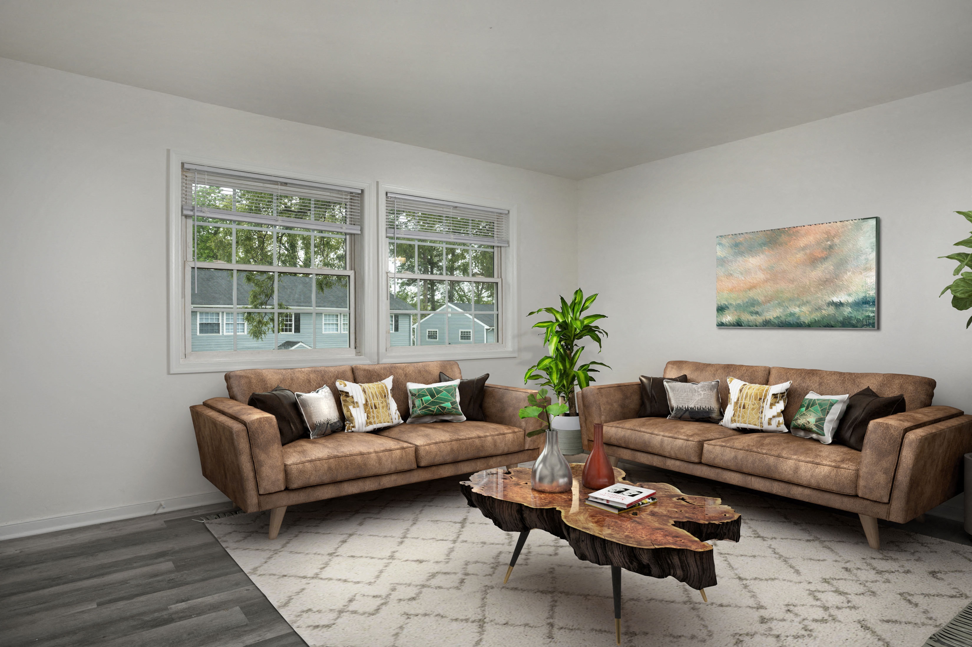 a living room with two couches and a coffee table