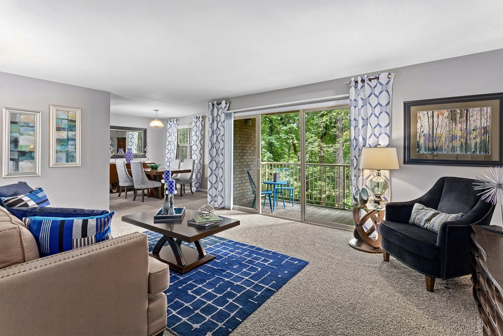 Living Room With Balcony at Versailles Apartments, Towson