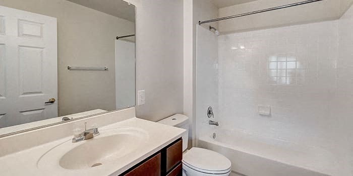 a bathroom with a sink toilet and a shower at Windsor Crossing, Suitland, 20746 
