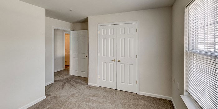 the wall of a building with letters and numbers on it at Windsor Crossing, Suitland Maryland 
