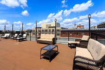 outdoor community space with lounge chairs at Empire, Washington, Washington