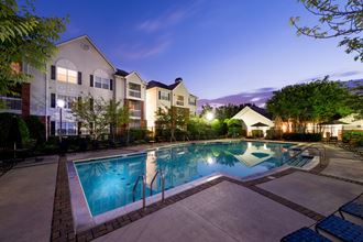 resort-style pool at night  at Governors Green, Bowie, MD, 20716