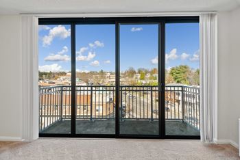 A room with a view of a balcony and buildings outside at The Brittany, Washington, DC, 20015