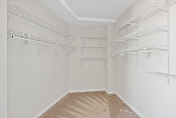 Empty white shelves in a room at The Brittany, Washington, DC, 20015