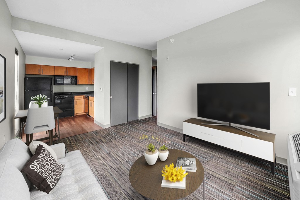 a living room with a couch and a tv