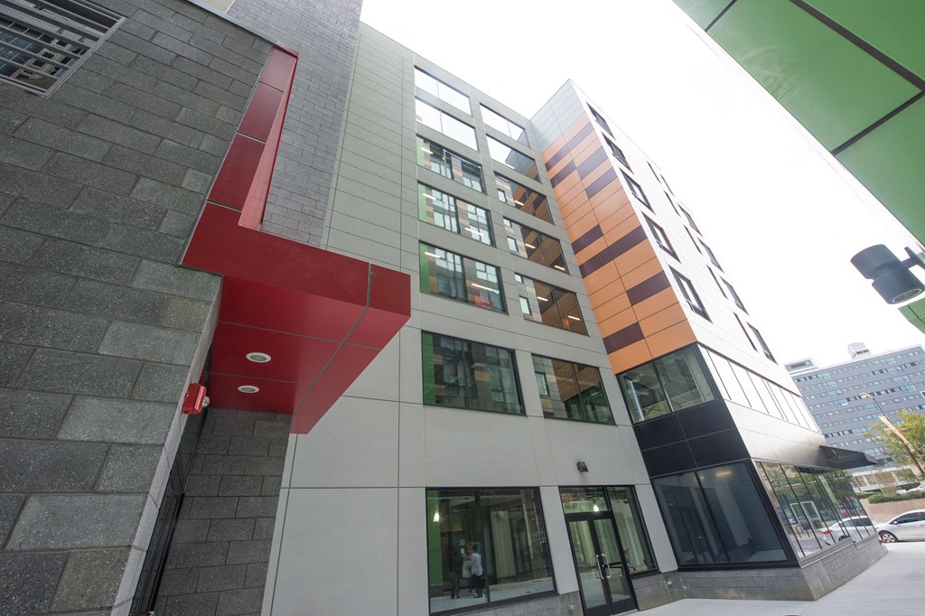 a building with a large red number on the side of it