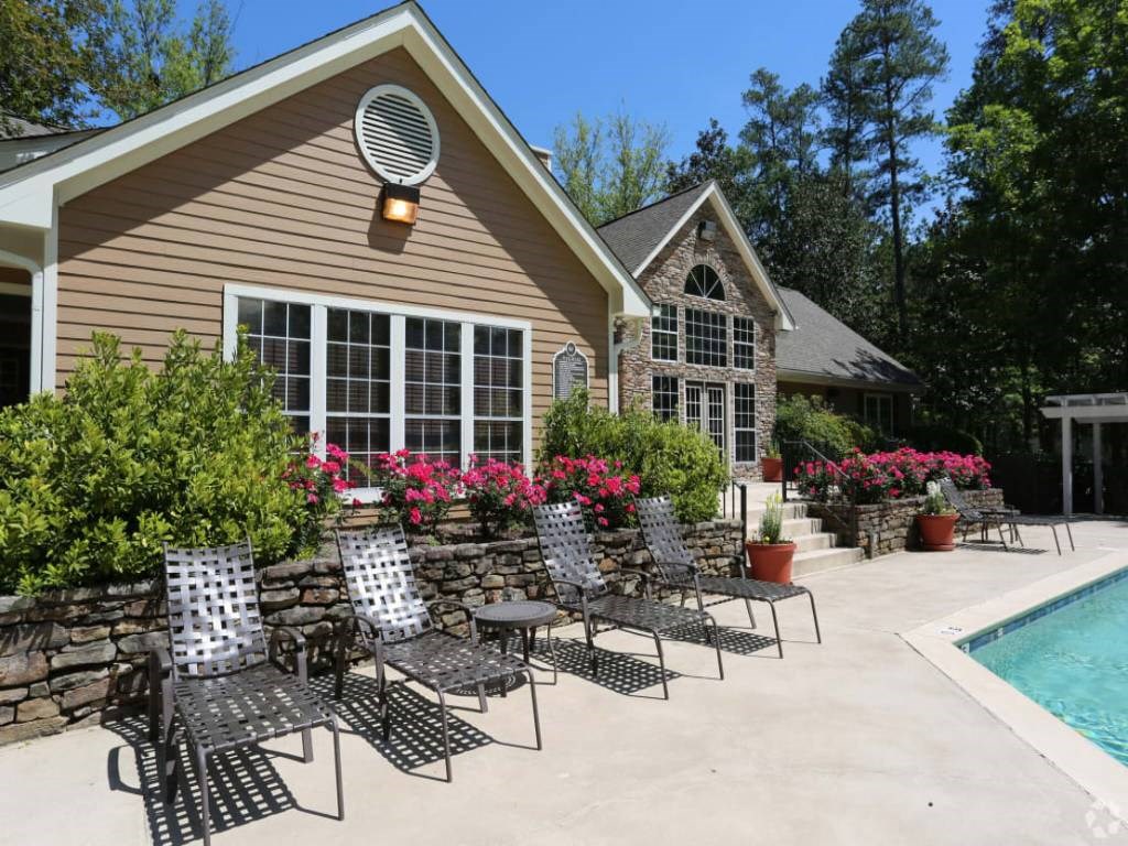 the pool and patio area at the house