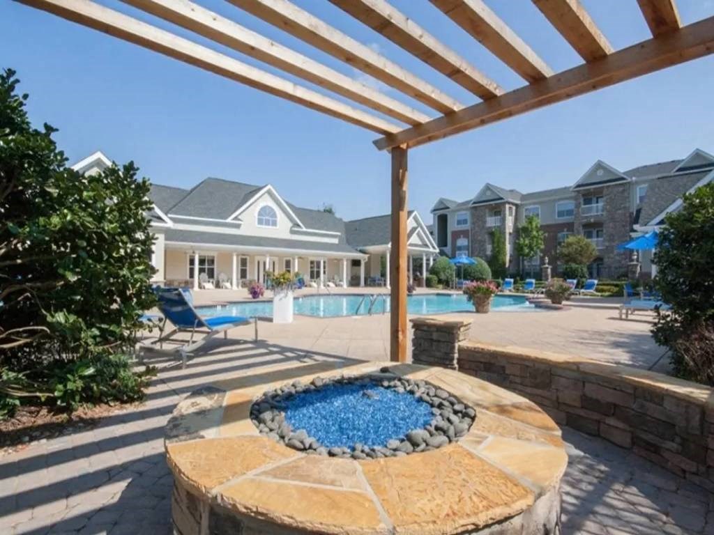 Swimming Pool area at Elevate Eagles  ApartmentsLanding, Stockbridge, 30281