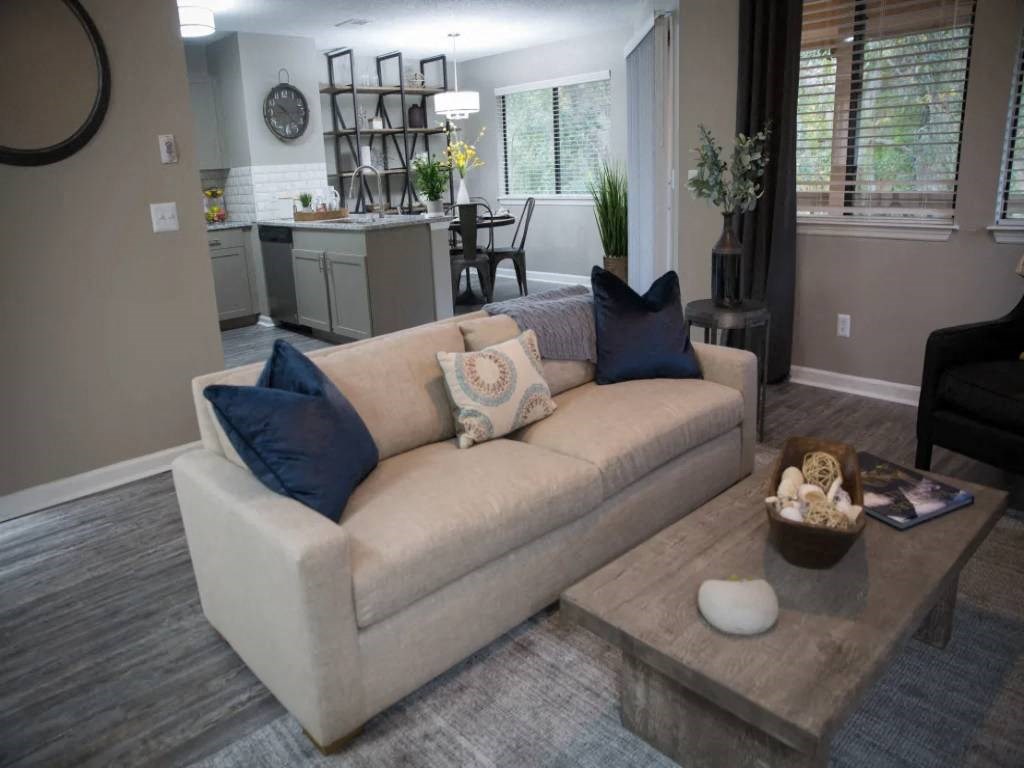 a living room with a couch and a coffee table