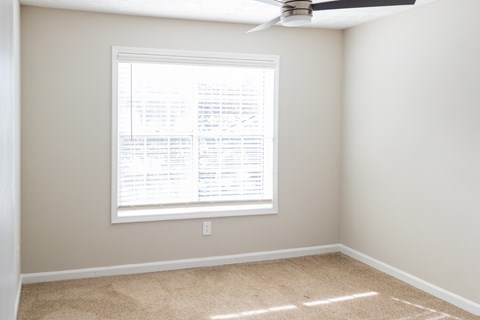 Bedroom with plush carpet at Twin Springs, Norcross, GA