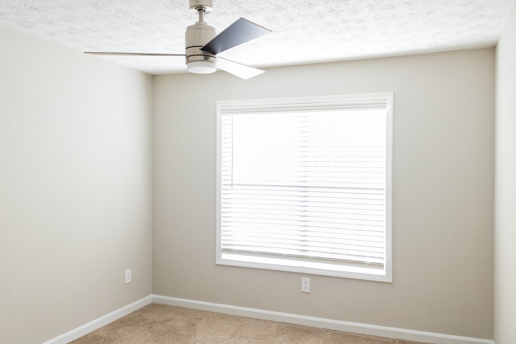 Ceiling fan and freshly painted walls at Twin Springs Apartments, Norcross, GA