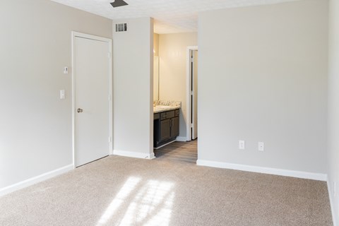 Bedroom with full size bathroom at Twin Springs Apartments, Norcross, GA