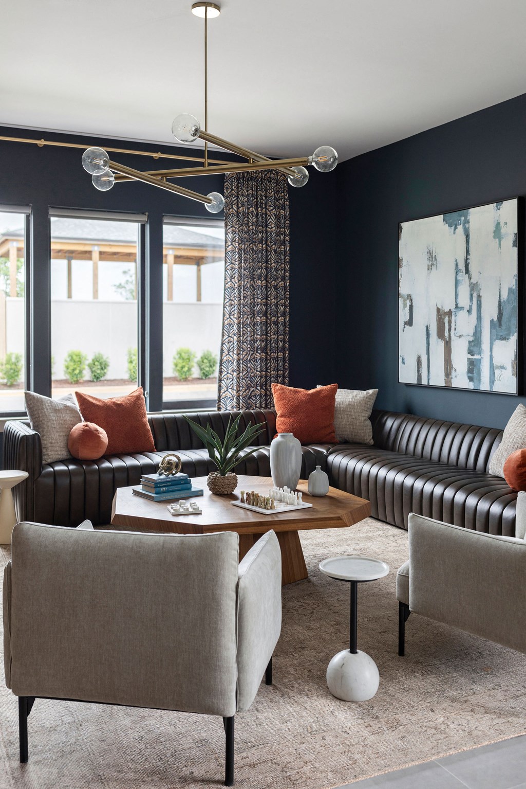 a living room with couches and chairs and a coffee table at The Cannon, Murfreesboro