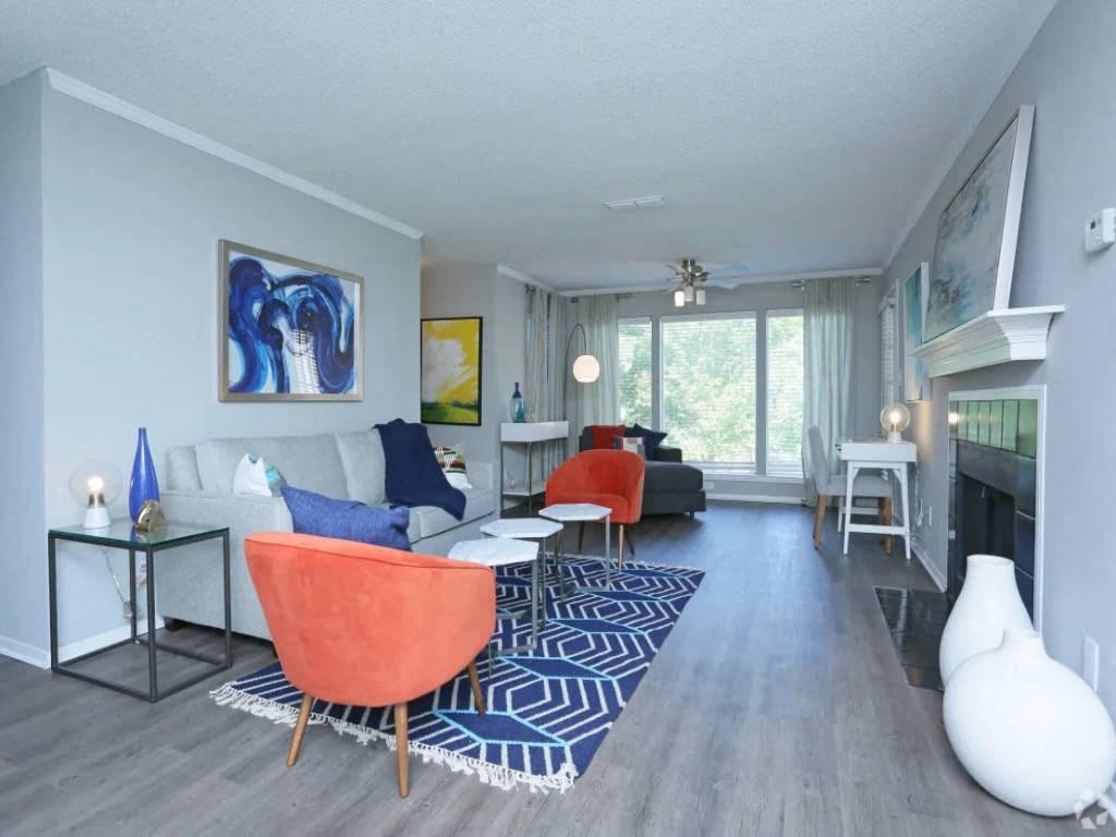 a living room with a couch and a fireplace