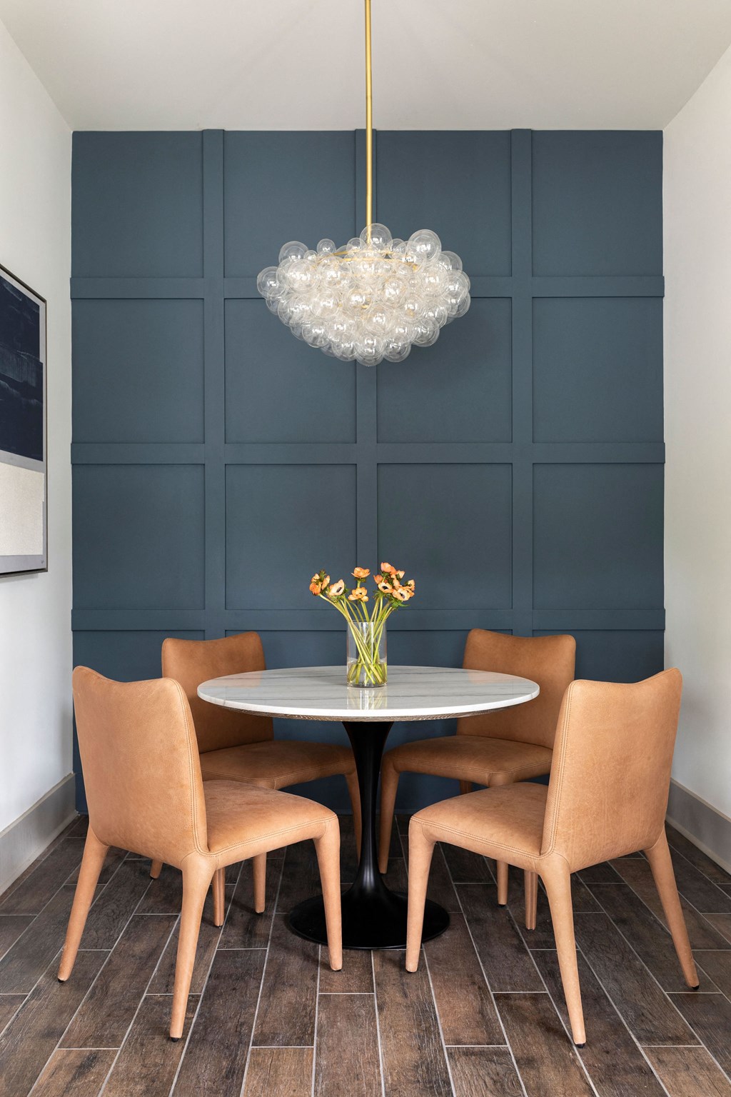 a dining room with a table and chairs and a chandelier at The Cannon, Tennessee