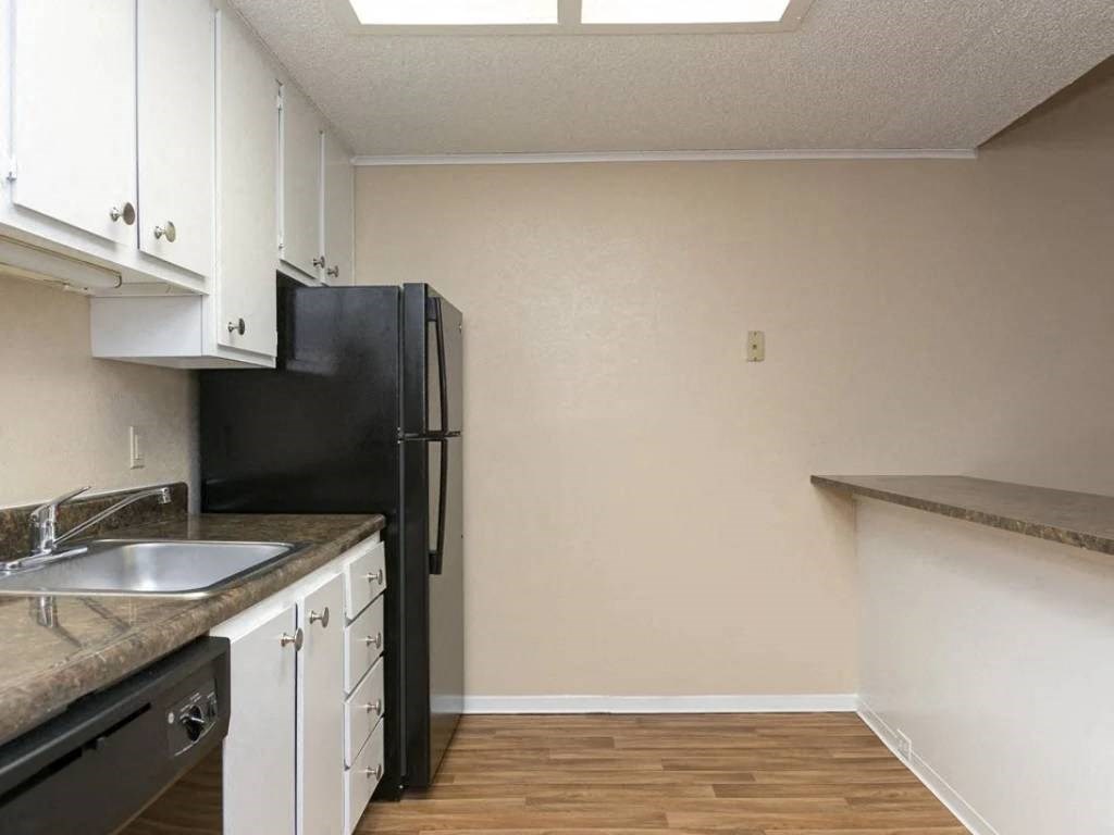 Stainless Steel Sink With Faucet In Kitchenat Elevate Woodstock Apartmnets, Georgia