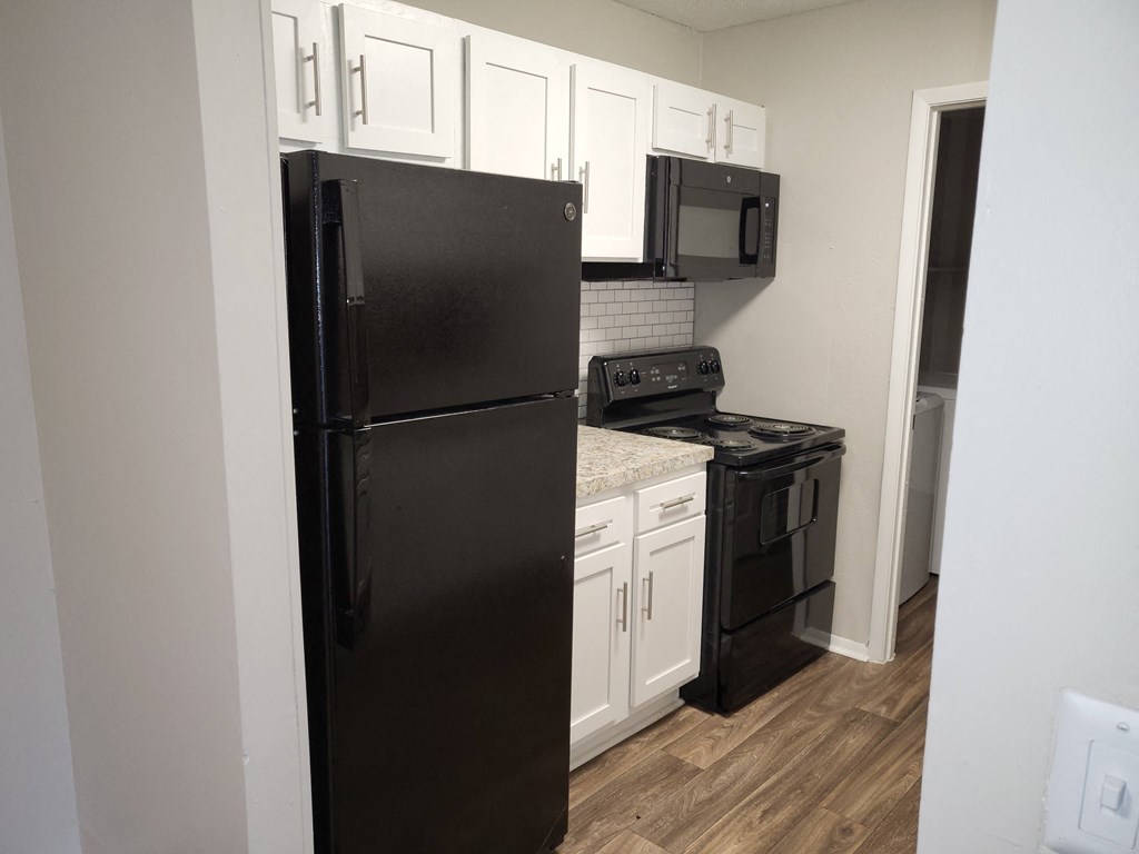 Black appliances at Magnolia Place at Stockbridge Apartments, Georgia, 30281