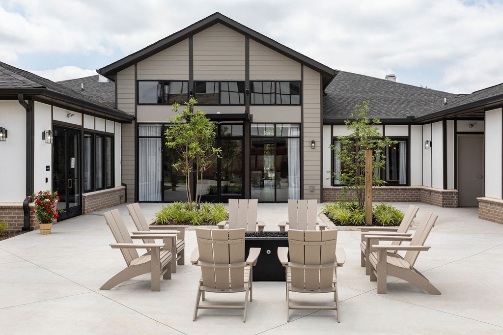a patio with a table and chairs in front of a house at The Cannon, Murfreesboro, TN