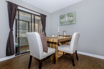 Dining table at Arbors at East Cobb Apartments, Georgia, 30062 - Photo Gallery 21