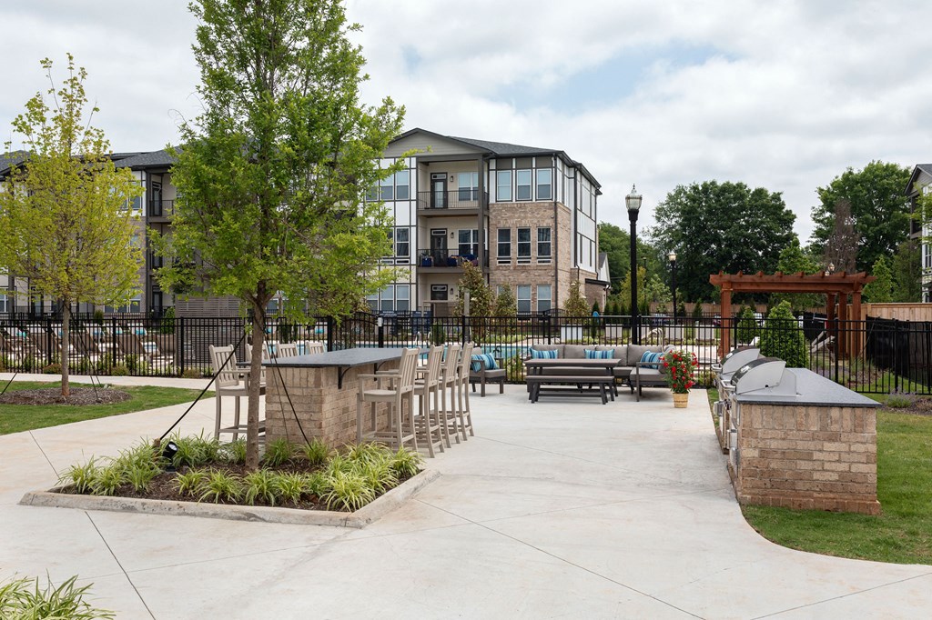 our apartments have a large yard with a patio and a pool at The Cannon, Murfreesboro, 37130