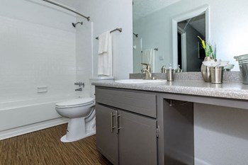 Bathroom with vanity at Arbors at East Cobb Apartments, Marietta, Georgia - Photo Gallery 24