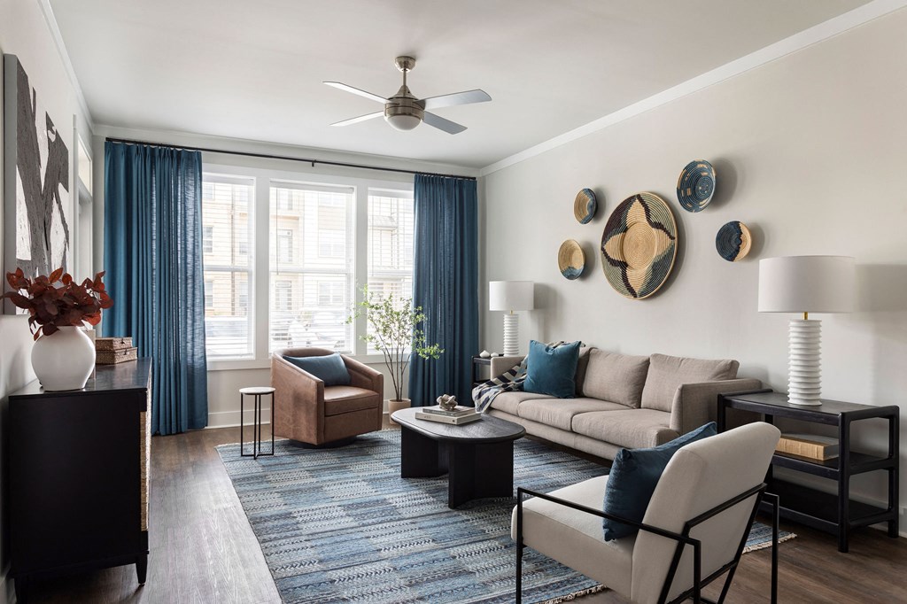 a living room with a couch and a chair at The Cannon, Murfreesboro, TN 37130