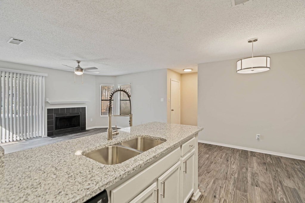 Amberwood at Lochmere, Cary NC, kitchen overlooking sink into living room